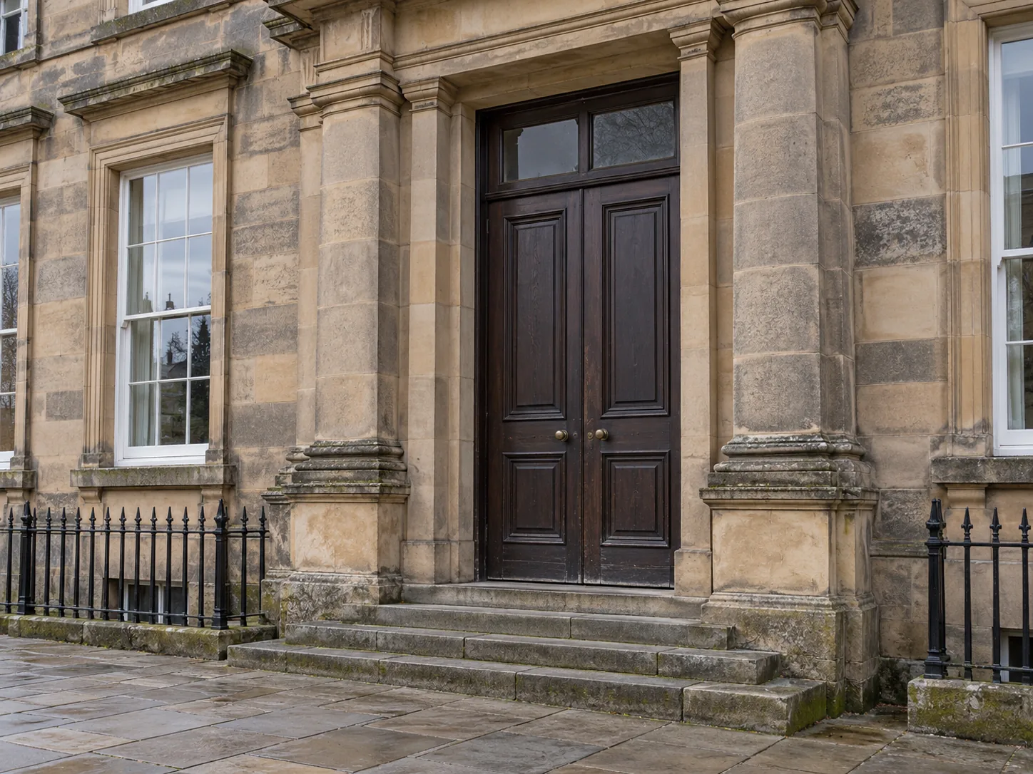 Illustration of a closed timber doorway in a Scottish-style sandstone civic building